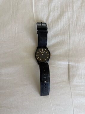 Nixon Black Leather Watch with Gold Markers